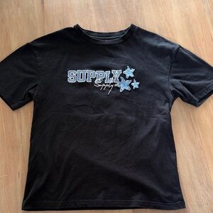 Black youth boys Supply and Demand T Shirt with Blue Star Accents